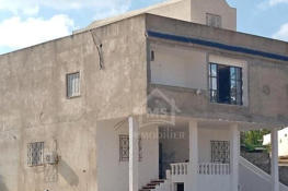 Une maison avec garage et jardin à birbouregba à vendre 51355351