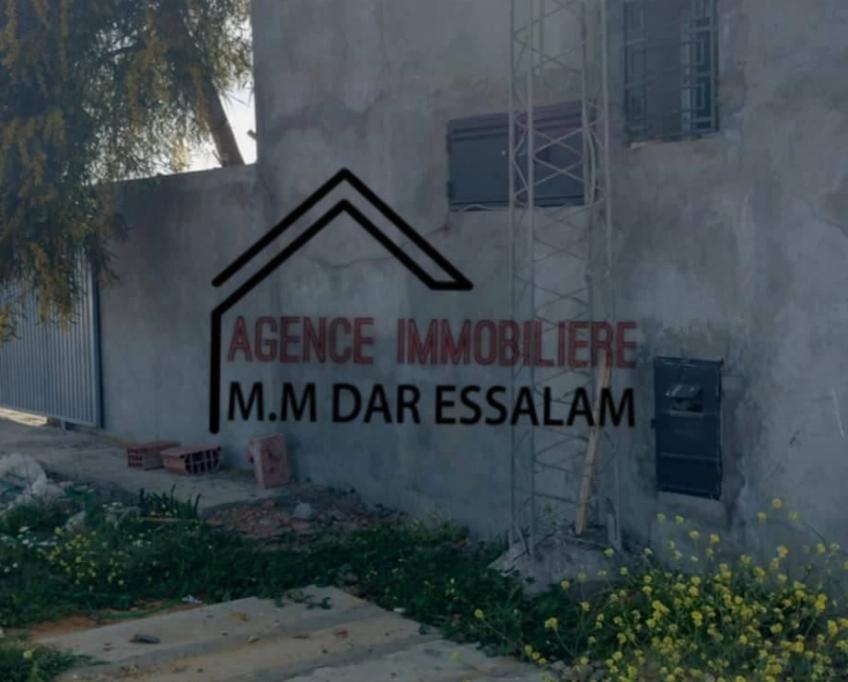 Terrain agricole contenant une maison à vendre