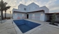 Villa avec piscine - titre bleu - zone urbaine djerba - réf v553